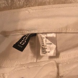 H&M Shorts - white high waisted shorts ripped in size 2 H&M Shorts - white high waisted shorts ripped in size 2